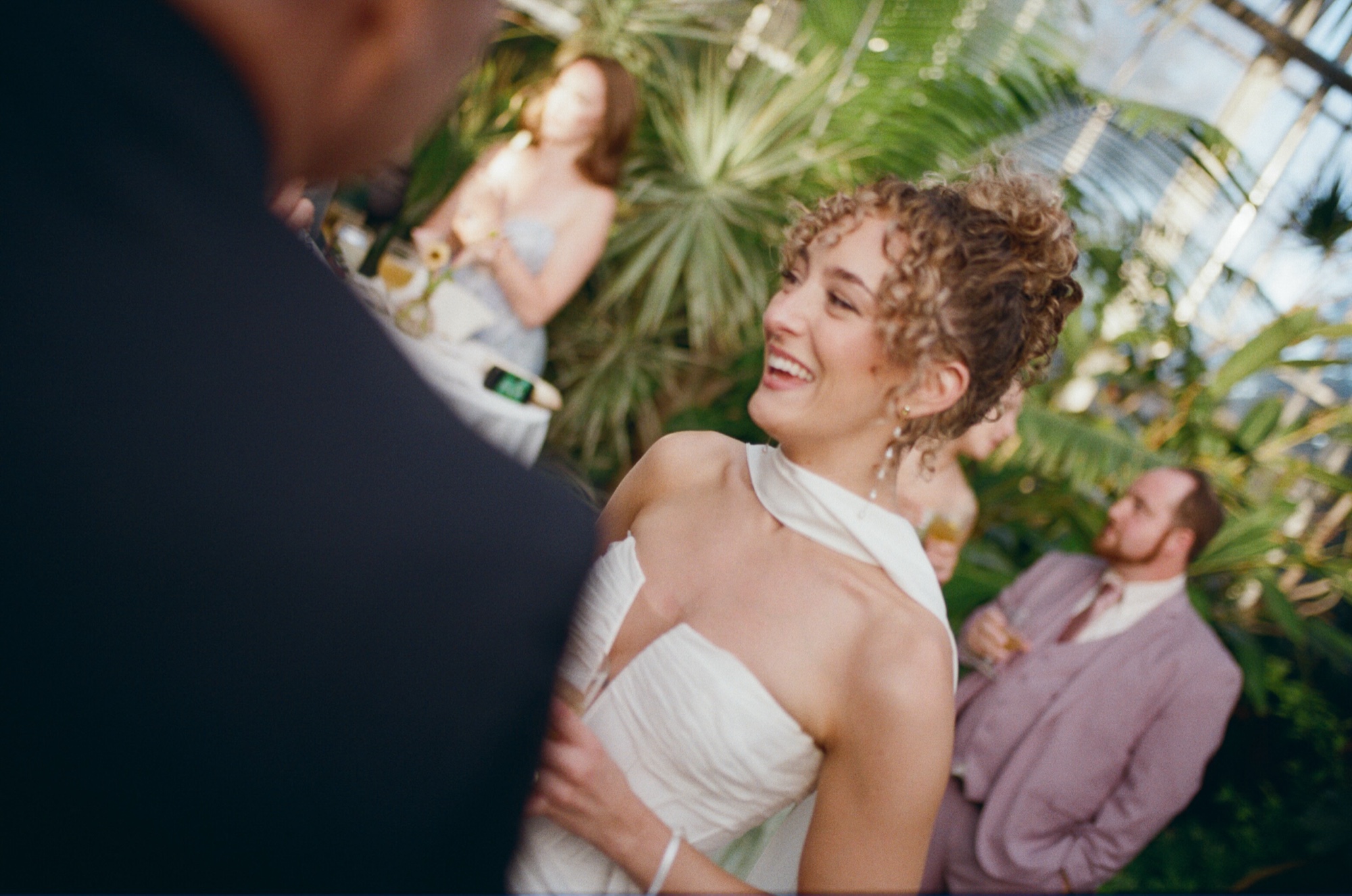 Bride laughing at cocktail hour