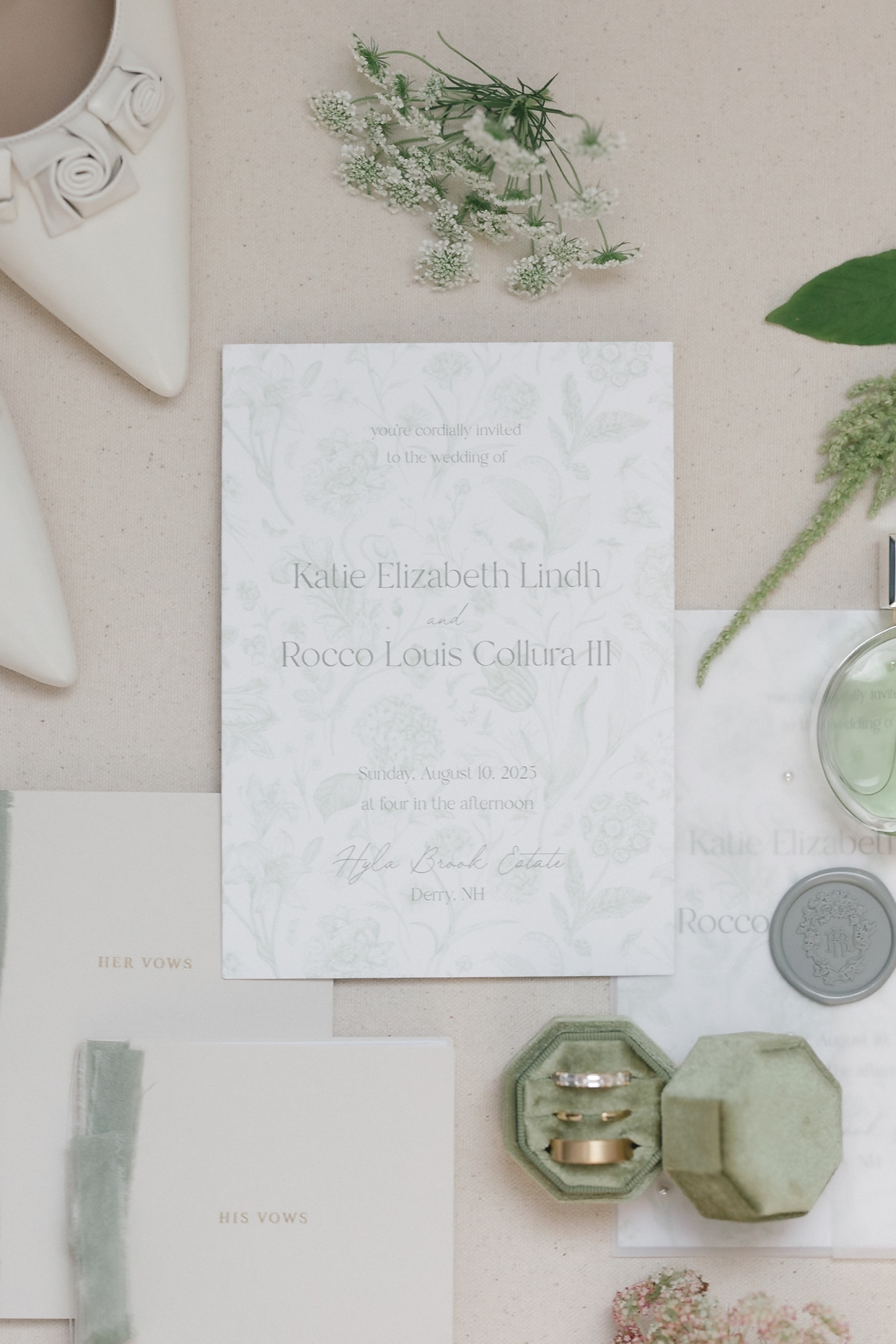 Invitation flat lay with rings
